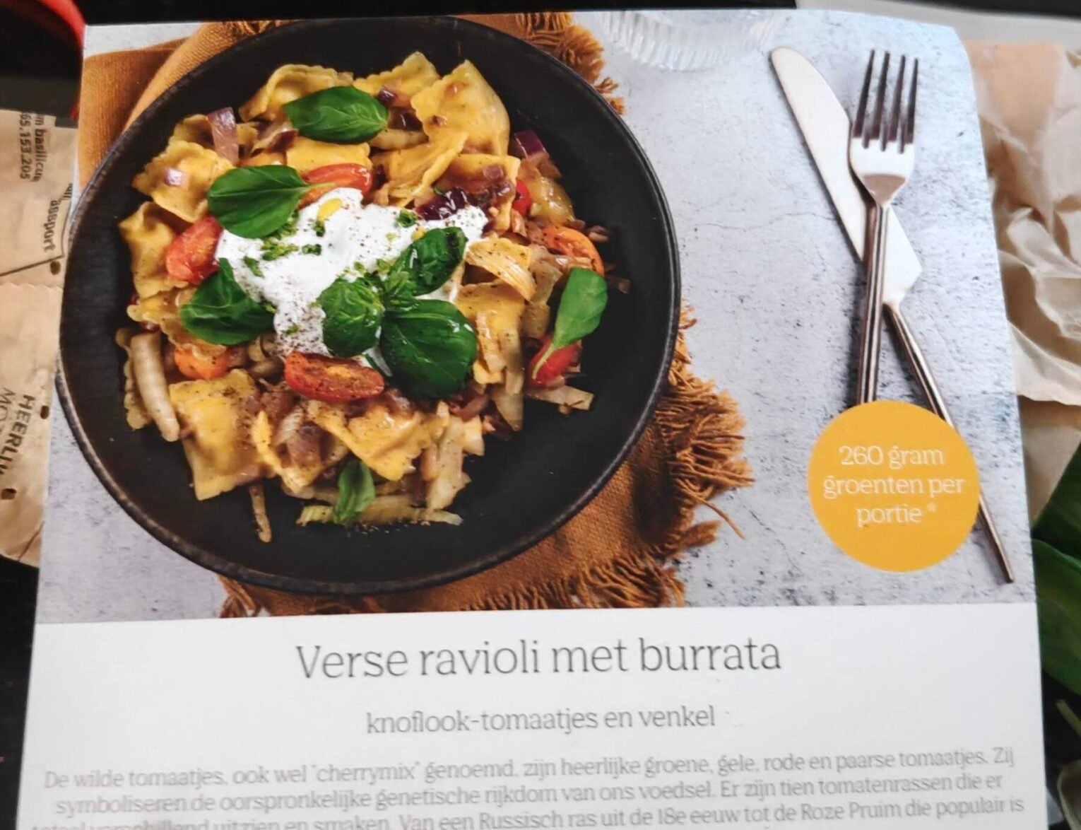 Receptkaart van Ekomenu voor verse ravioli met burrata, knoflook-tomaatjes en venkel, met 260 gram groenten per portie